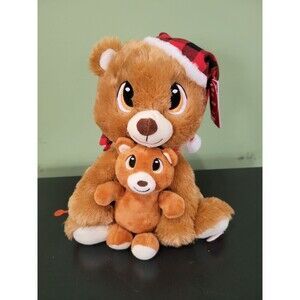 Holiday Teddy Bear animating and sound making with baby plush toy